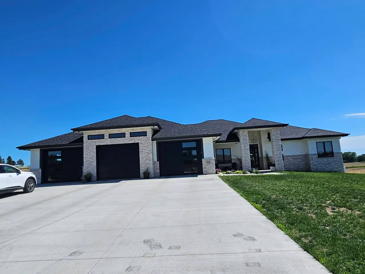 Large two-story home in the Omaha metro with new seamless gutters along the roofline